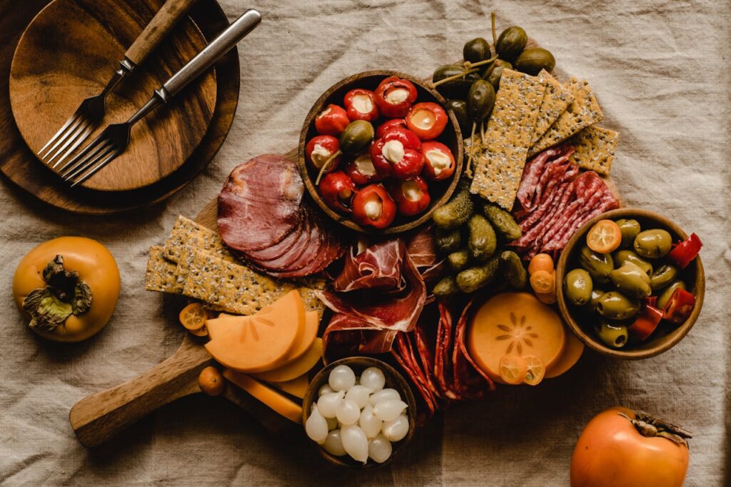 Exquisite charcuterie board featuring fresh fruits and cured meats. Perfect for gourmet gatherings.