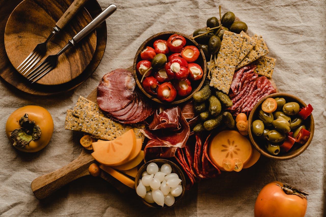 Exquisite charcuterie board featuring fresh fruits and cured meats. Perfect for gourmet gatherings.